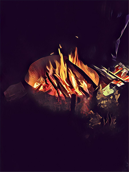 an altered photo of a campfire giving it a cartoonish appearance